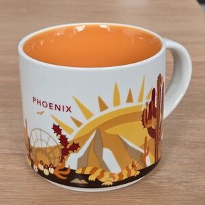 Starbucks White and Orange Ceramic Mug with Sun Design
